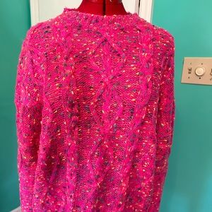 Hot pink sweater with specks for color